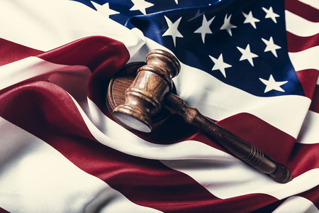 Wooden gavel and USA flagの写真素材