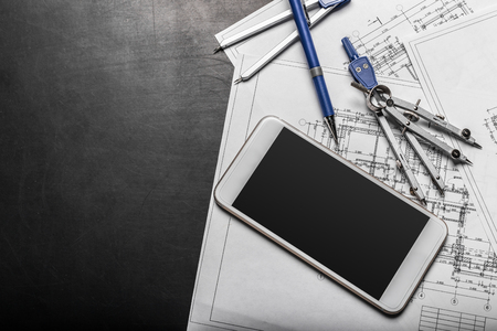 Construction planning drawings on black backgroundの写真素材