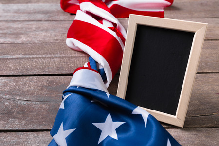 Blank chalk board with American Flagの写真素材