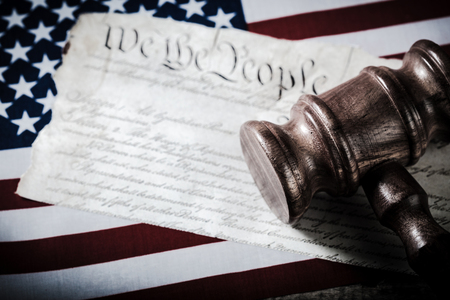 Wooden gavel and USA flagの写真素材