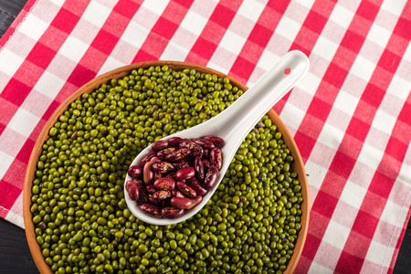 mix of beans on wooden table