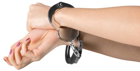 hand wearing handcuffs isolated on white background
