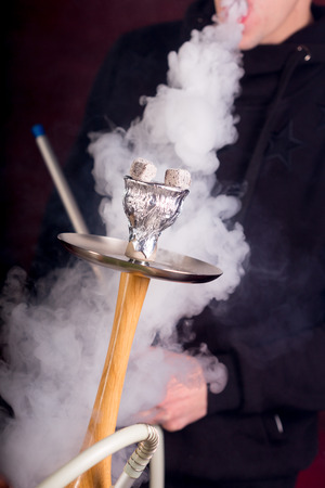 Hookah smoke on dark backgroundの写真素材