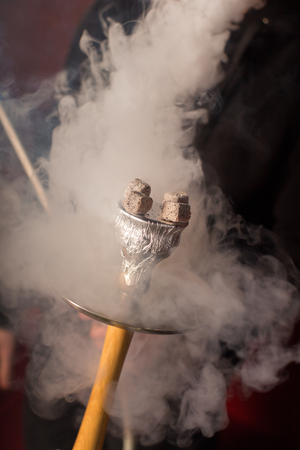 Hookah smoke on dark backgroundの写真素材