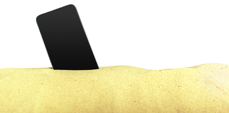 Phone on the sandの写真素材