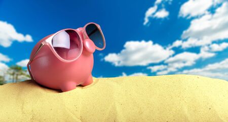 Summer piggy bank with sunglasses on the beachの写真素材