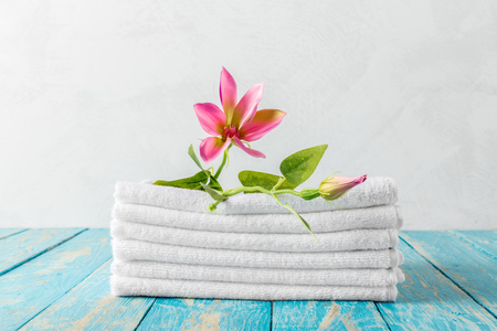 Beautiful spa composition on wooden table with flowersの写真素材