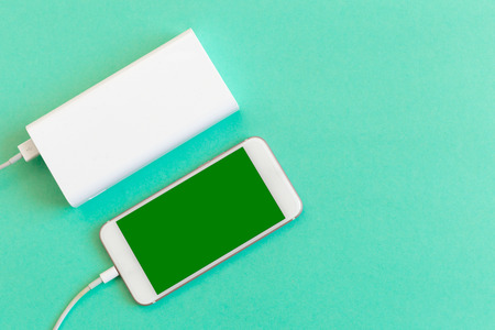 Smartphone charging with power bankの写真素材