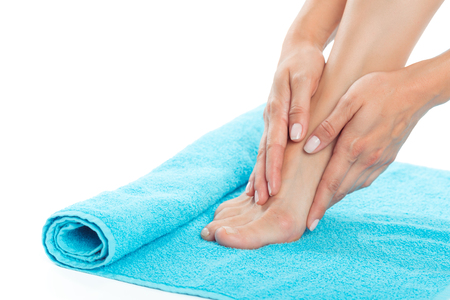 Beautiful female feet at spa salonの写真素材
