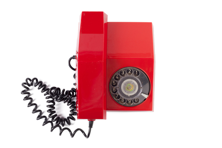 Red old telephone on white backgroundの写真素材