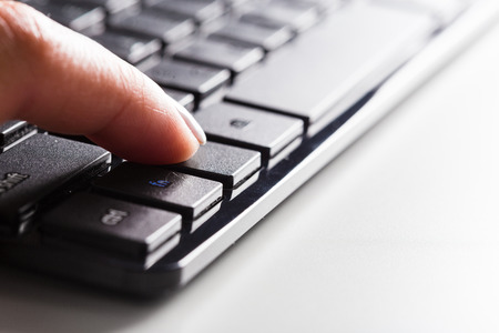keyboard. Finger pressing button.の写真素材
