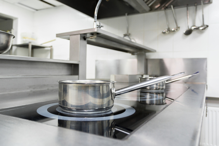 Stove counter in a modern restaurant kitchenの写真素材