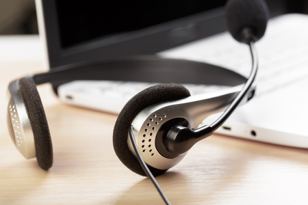 headset on keyboard computer laptopの写真素材