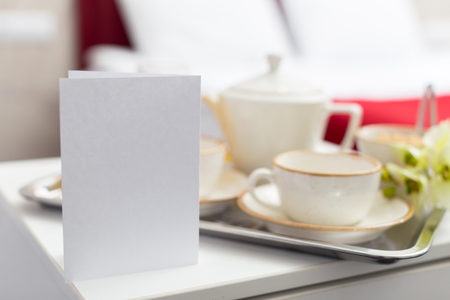 Breakfast in bed in hotel roomの写真素材