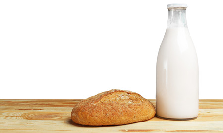 Bread and milk on the tableの写真素材