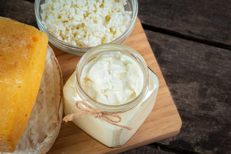 cheese on wooden tableの写真素材