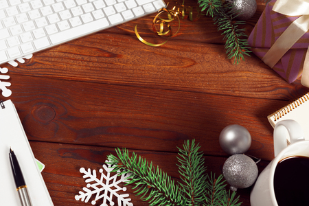 Greeting card and gift box on office tableの写真素材