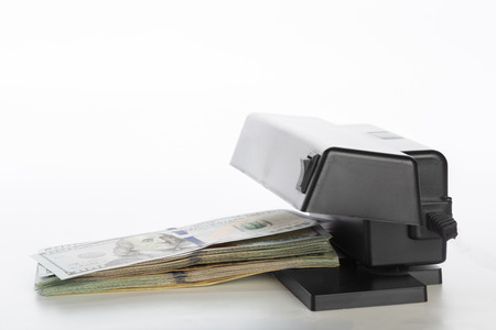 money checker isolated on white