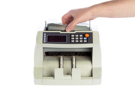 money counter isolated on whiteの写真素材