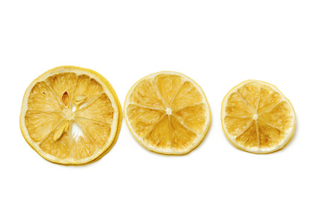 dried citrus fruit isolated on whiteの写真素材