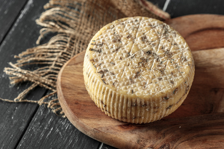Cheese on the wooden tableの写真素材