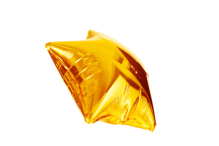  gold big star metallic balloon isolated on whiteの写真素材