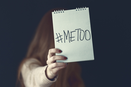 woman showing a note with the text me tooの写真素材