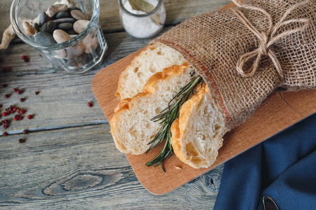 Sliced  baked bread on dark backgroundの写真素材