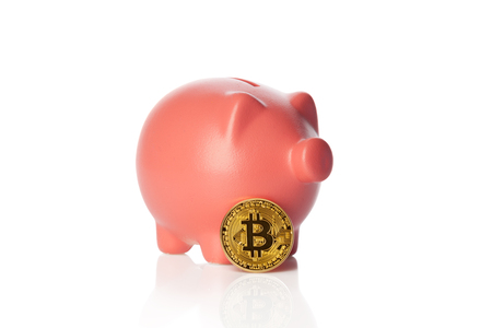 bitcoins saving in a piggy bankの写真素材