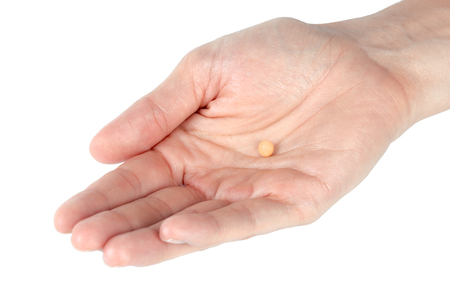 pills in woman handの写真素材