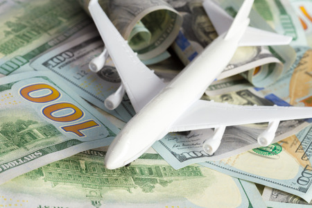 airplane on the moneyの写真素材