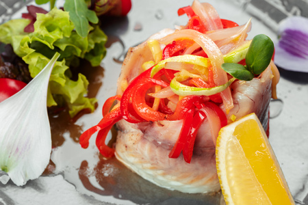 Herring fillet served with onionの写真素材