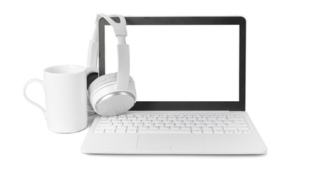 laptop and headphone isolated on whiteの写真素材