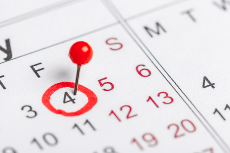 Closeup of dates on calendar pageの写真素材