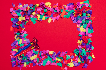 Festive party decor and confetti on pink backgroundの写真素材