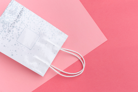 paper shopping bag on colorful background