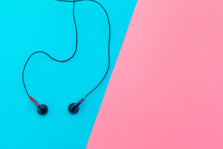 Earphons on color background.の写真素材