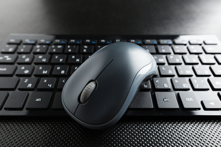 keyboard and mouse on the table .