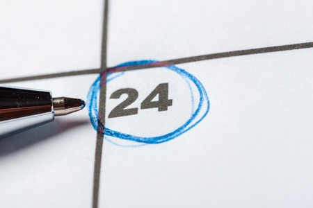 Closeup of dates on calendar page