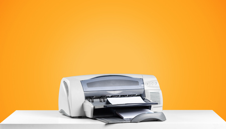 Printer copier machine on a bright colored background