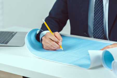 architect sitting at desk and working