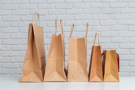 Shopping bags on tableの写真素材