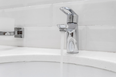 chrome faucet in modern bathroom