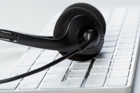 headset on keyboard computer laptopの写真素材