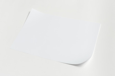 White business card on wooden table. Blank portrait A4.の写真素材