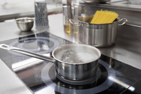 Stove counter in a modern restaurant kitchenの写真素材