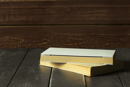 Books close up on old wooden tableの写真素材
