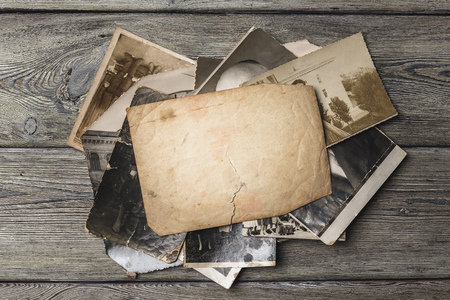 retro some old photos on wooden tableの写真素材