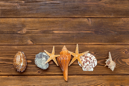 Beach accessories on wooden board