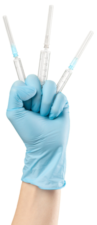 Syringe in hand isolated on whiteの写真素材